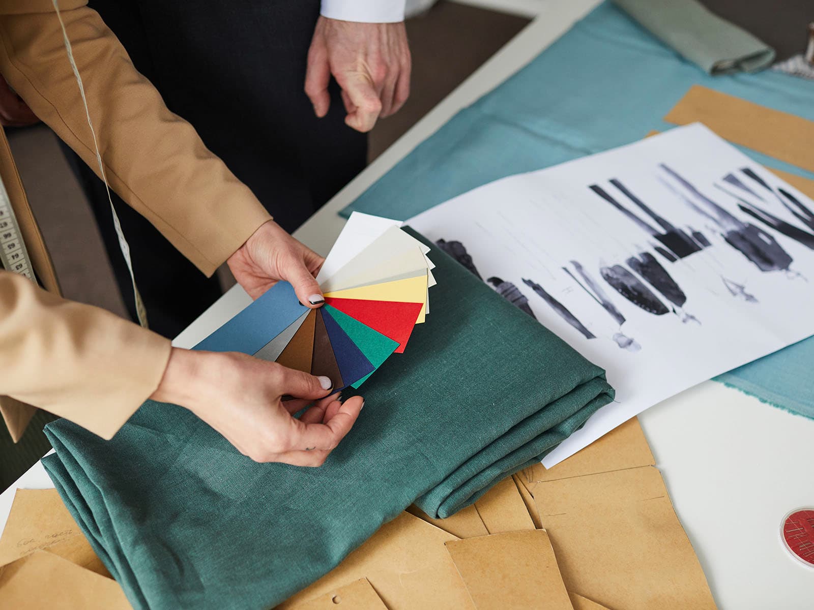 ThreadCo design experts choosing colours for a custom apparel project